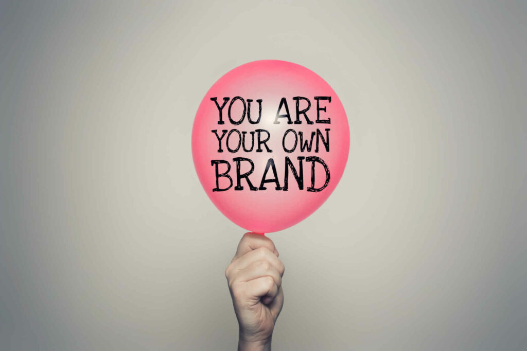 You are your own brand balloon in hand